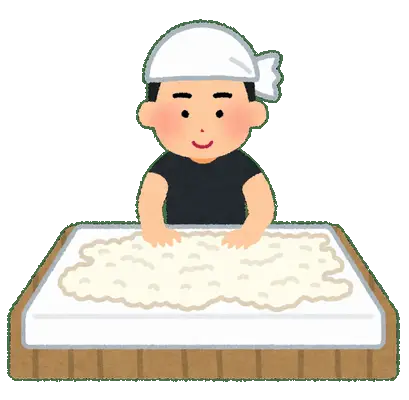 ねじり鉢巻で麹づくりをしている様子